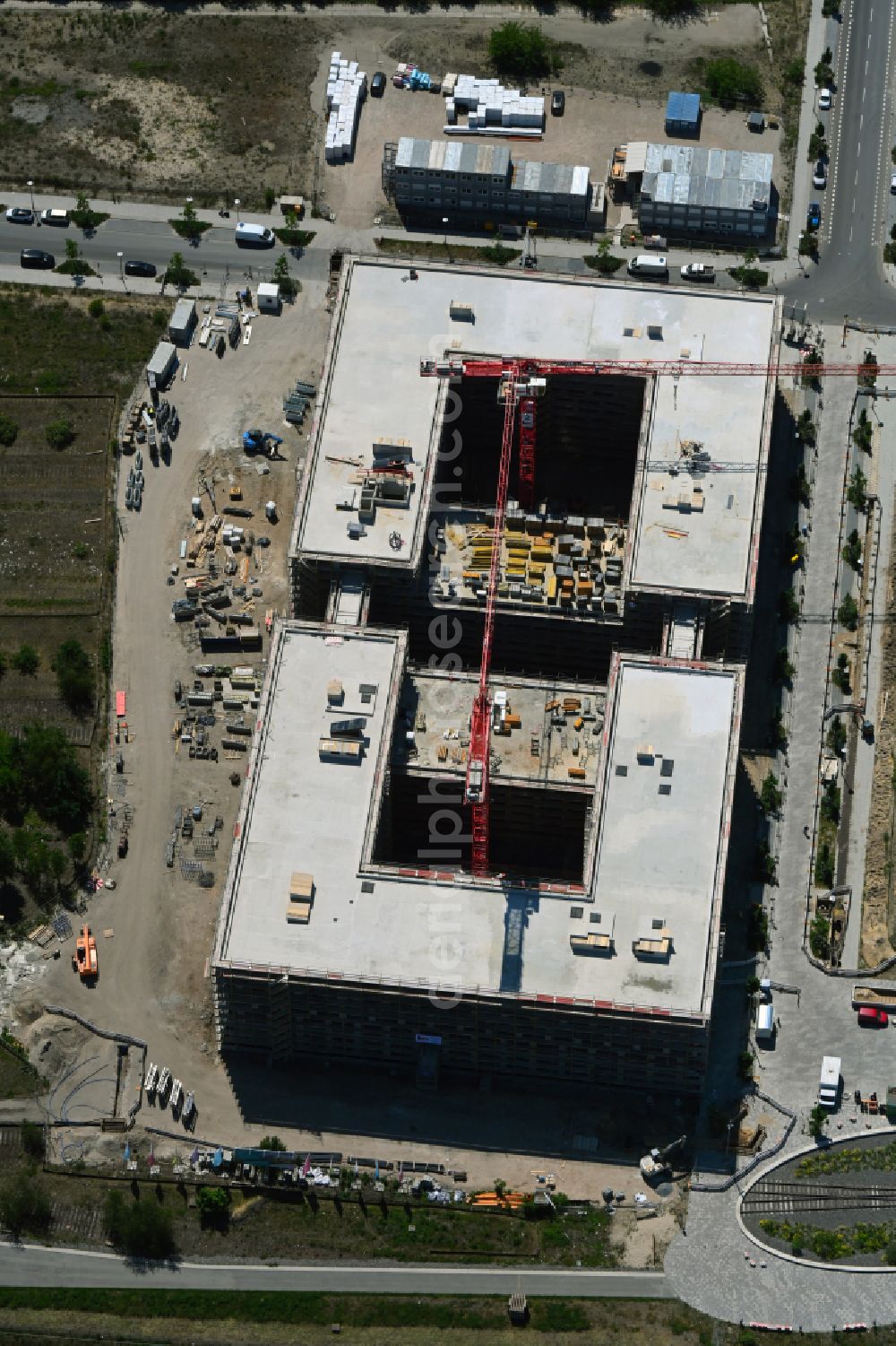 Aerial image Berlin - Construction site to build a new multi-family residential complex of the project Square 1 on Wagner-Regeny-Allee in the district Niederschoeneweide in Berlin, Germany