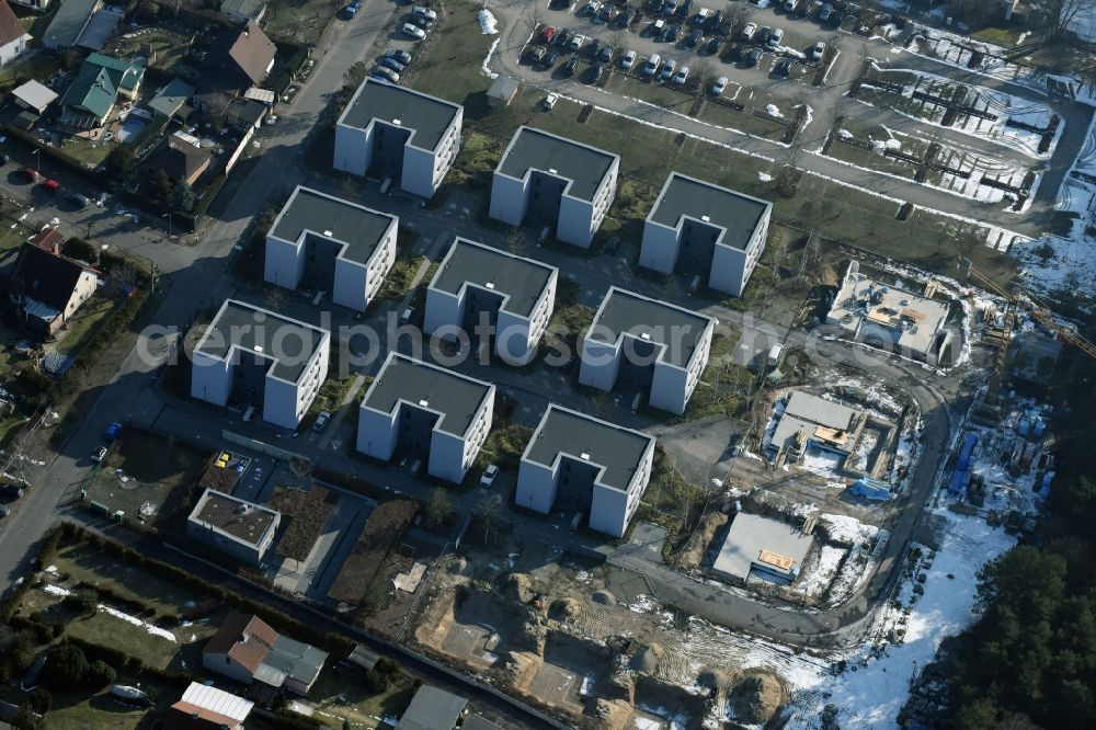 Berlin from above - Construction site to build a new multi-family residential complex Waldkiefernweg - Faehenweg - Waldstrasse in the district Gruenau in Berlin