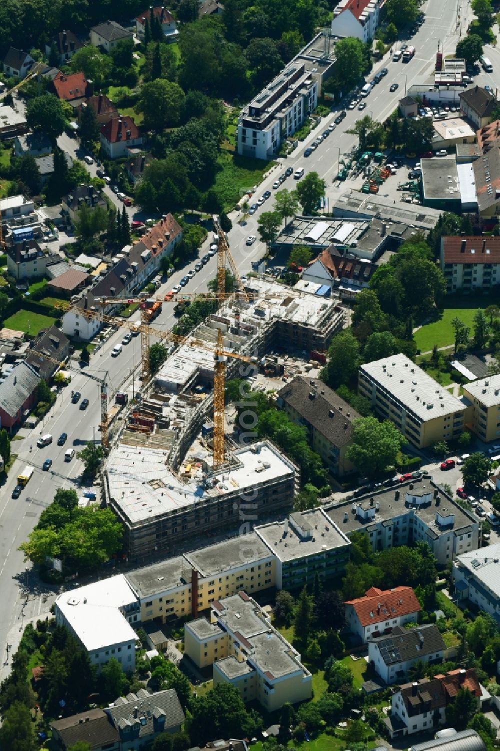 München from the bird's eye view: Construction site to build a new multi-family residential complex of walser projekt management gmbh on Freisinger Landstrasse - Floriansmuehlstrasse in Munich in the state Bavaria, Germany