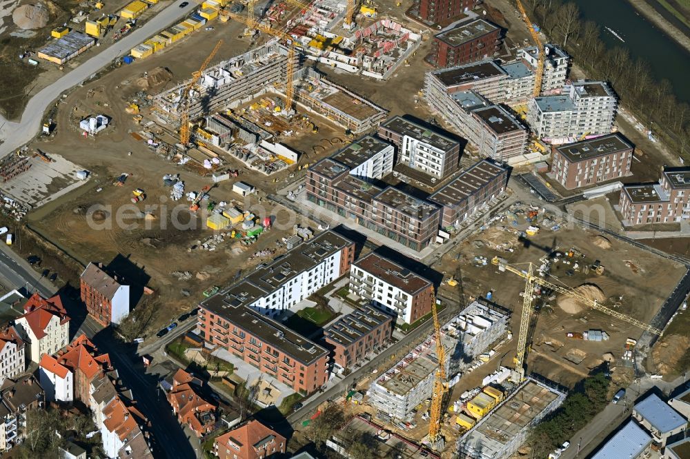 Hannover from above - Construction site to build a new multi-family residential complex Wasserstadt Limmer in the district Limmer in Hannover in the state Lower Saxony, Germany