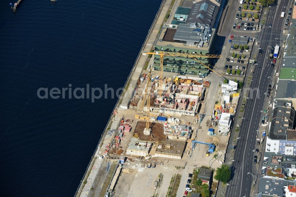 Berlin from above - Construction site to build a new multi-family residential complex WATERSIDE LIVING BERLIN on the former Osthafen port on Stralauer Allee in the district Friedrichshain-Kreuzberg in Berlin, Germany