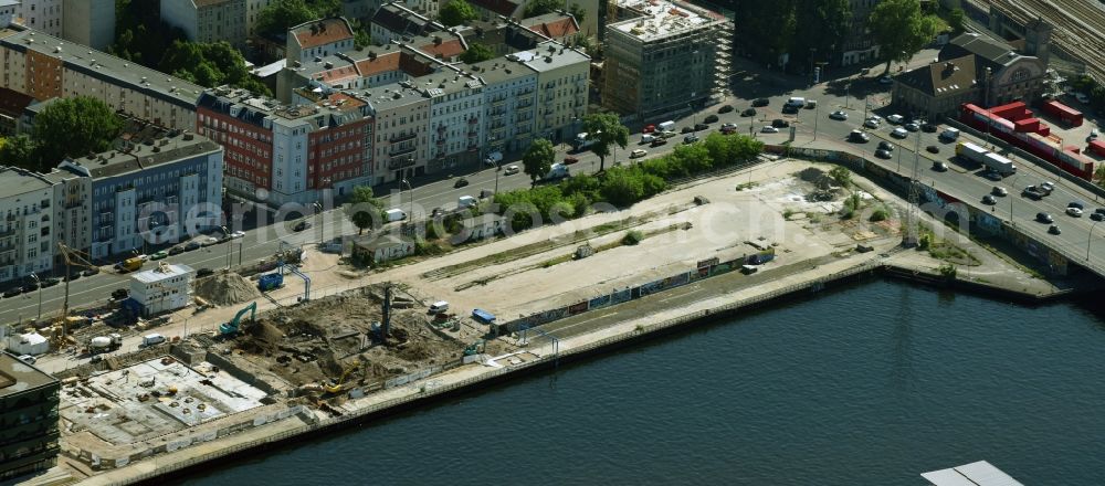 Aerial image Berlin - Construction site to build a new multi-family residential complex WATERSIDE LIVING BERLIN on the former Osthafen port on Stralauer Allee in the district Friedrichshain-Kreuzberg in Berlin, Germany