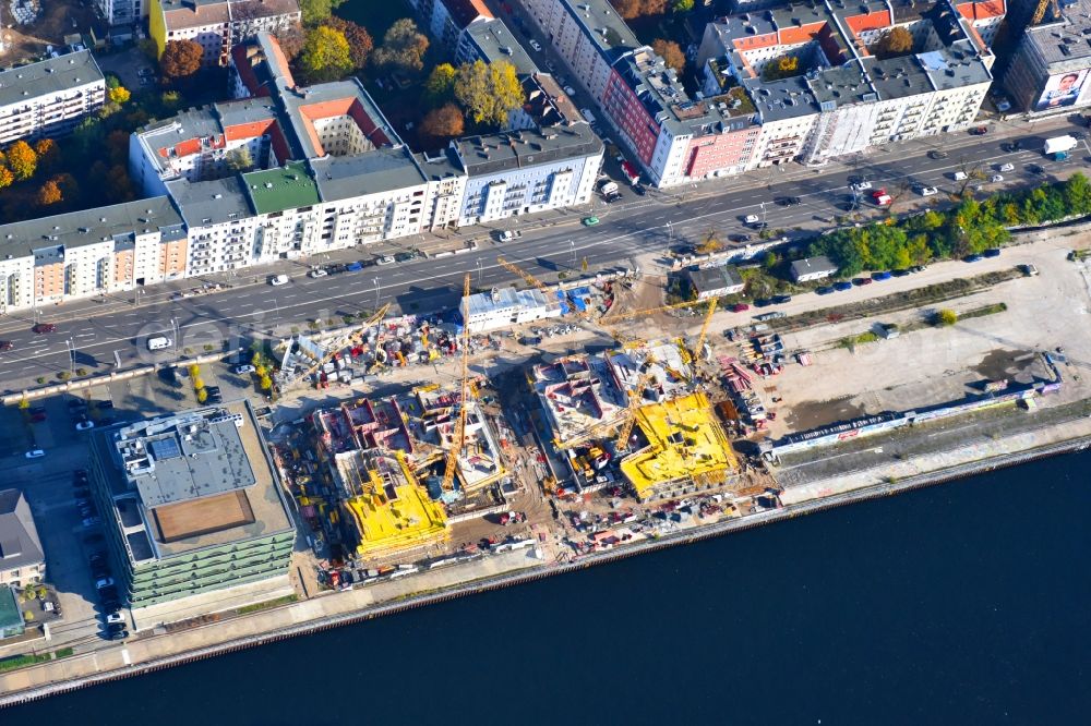 Berlin from above - Construction site to build a new multi-family residential complex WATERSIDE LIVING BERLIN on the former Osthafen port on Stralauer Allee in the district Friedrichshain-Kreuzberg in Berlin, Germany