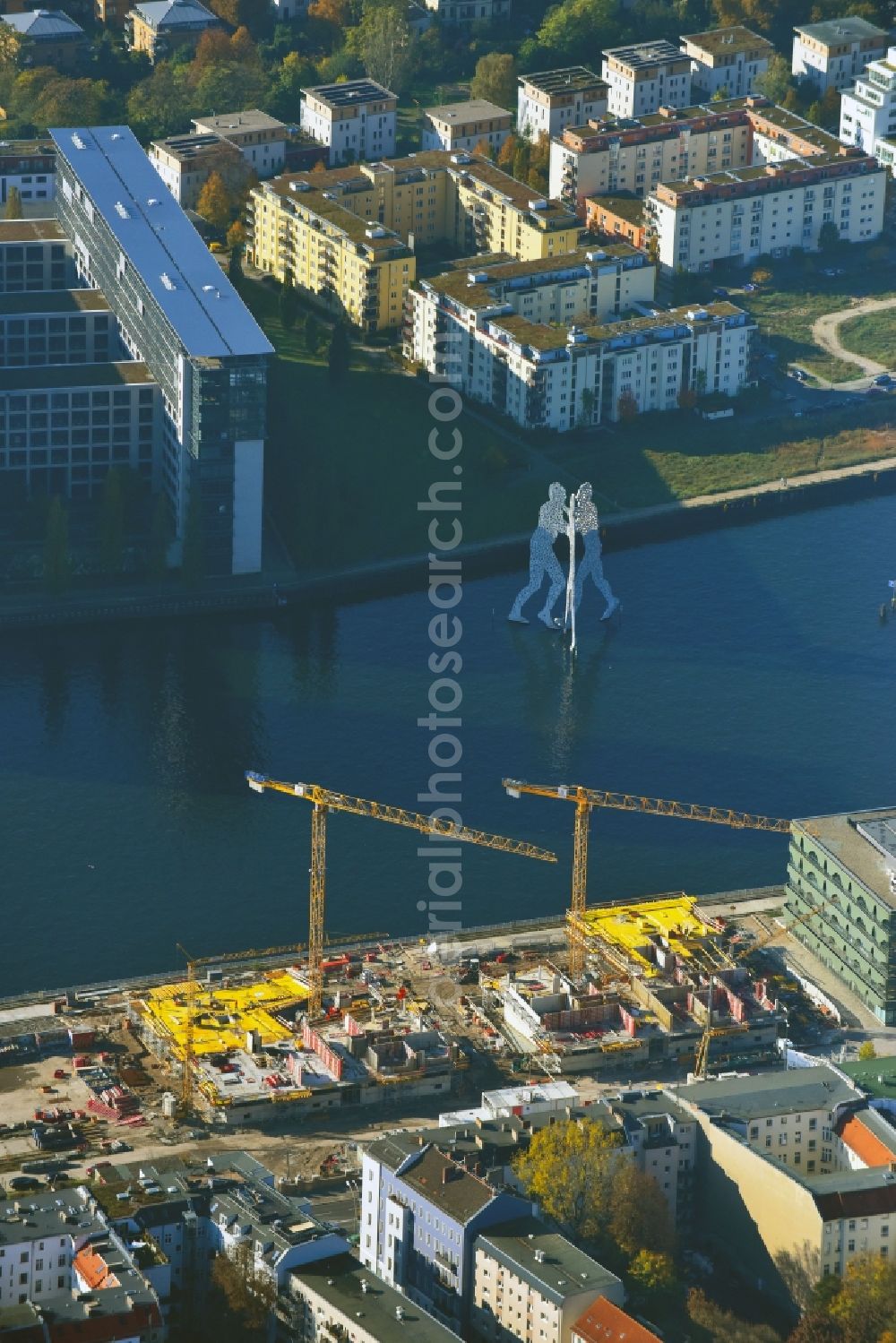 Berlin from above - Construction site to build a new multi-family residential complex WATERSIDE LIVING BERLIN on the former Osthafen port on Stralauer Allee in the district Friedrichshain-Kreuzberg in Berlin, Germany