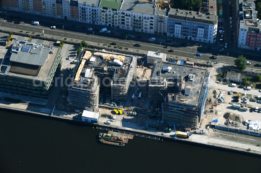 Aerial image Berlin - Construction site to build a new multi-family residential complex WAVE WATERSIDE LIVING BERLIN on the former Osthafen port on Stralauer Allee in the district Friedrichshain in Berlin, Germany