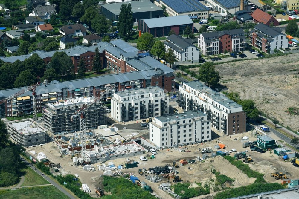 Berlin from above - Construction site to build a new multi-family residential complex on Weissenhoeher Strasse - Arno-Phillipstal-Strasse of Bonava Deutschland GmbH im Stadtteil Kaulsdorf in Berlin