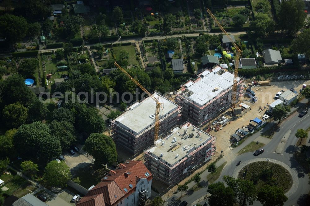 Bernau from above - Construction site to build a new multi-family residential complex at the road Oranienburger Strasse in Bernau in the state Brandenburg. A project of the Wohnungsbaugesellschaft Wobau Bernau