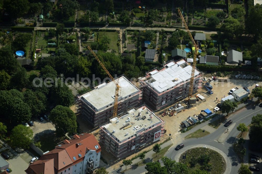 Bernau from the bird's eye view: Construction site to build a new multi-family residential complex at the road Oranienburger Strasse in Bernau in the state Brandenburg. A project of the Wohnungsbaugesellschaft Wobau Bernau