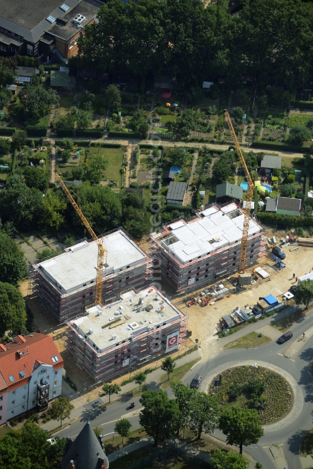 Aerial image Bernau - Construction site to build a new multi-family residential complex at the road Oranienburger Strasse in Bernau in the state Brandenburg. A project of the Wohnungsbaugesellschaft Wobau Bernau