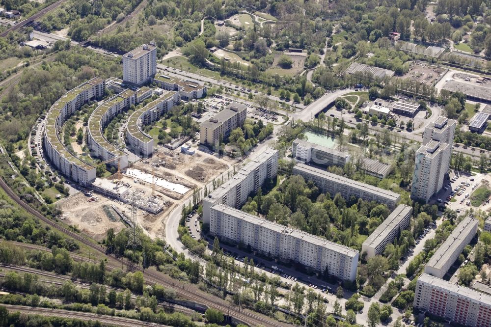 Berlin from the bird's eye view: Construction site of a new multi-family residential area with apartment buildings on Gensinger Strasse in the Lichtenberg district of Berlin, Germany