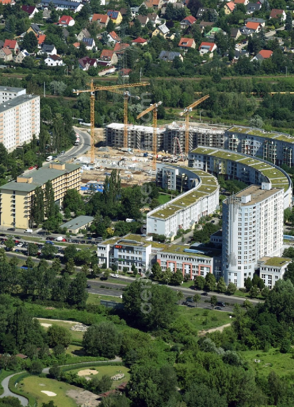 Berlin from the bird's eye view: Construction site of a new multi-family residential area with apartment buildings on Gensinger Strasse in the Lichtenberg district of Berlin, Germany