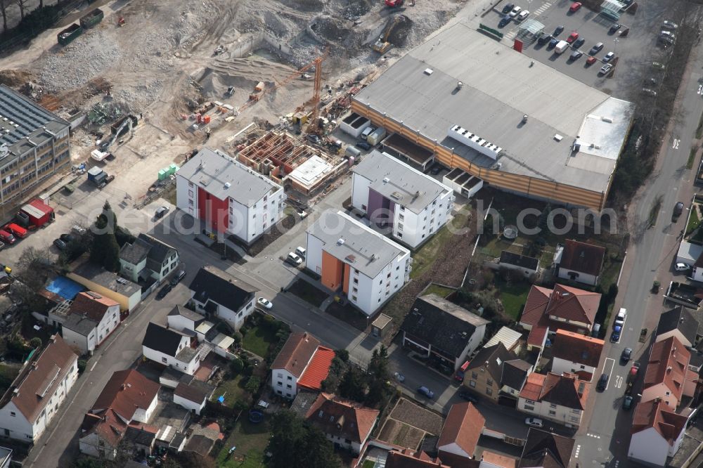 Nieder-Olm from the bird's eye view: Construction site to build a new multi-family residential complex at the Ludwig-Eckes-Allee in Nieder-Olm in the state Rhineland-Palatinate