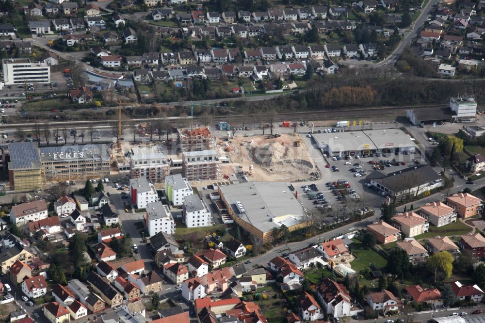 Nieder-Olm from the bird's eye view: Construction site to build a new multi-family residential complex at the Ludwig-Eckes-Allee in Nieder-Olm in the state Rhineland-Palatinate