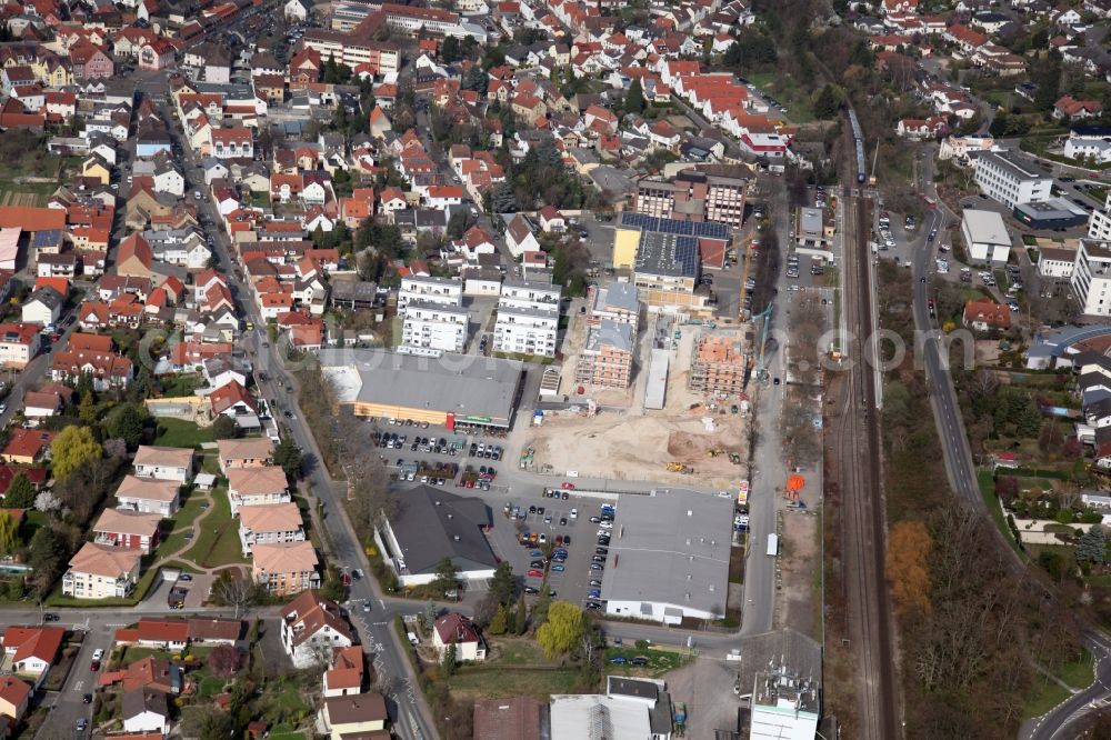 Aerial photograph Nieder-Olm - Construction site to build a new multi-family residential complex at the Ludwig-Eckes-Allee in Nieder-Olm in the state Rhineland-Palatinate