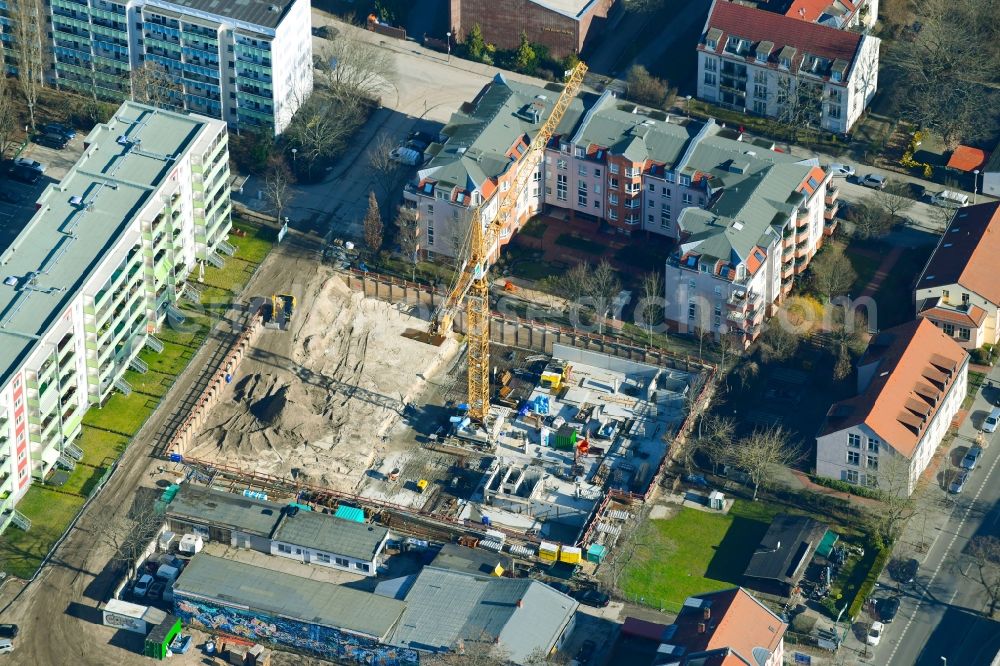 Berlin from above - Construction site to build a new multi-family residential complex of Wohnungsbaugenossenschaft Solidaritaet eG on Kurze Strasse in Berlin, Germany