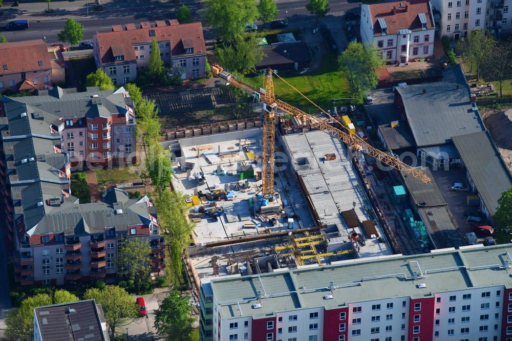 Berlin from above - Construction site to build a new multi-family residential complex of Wohnungsbaugenossenschaft Solidaritaet eG on Kurze Strasse in Berlin, Germany