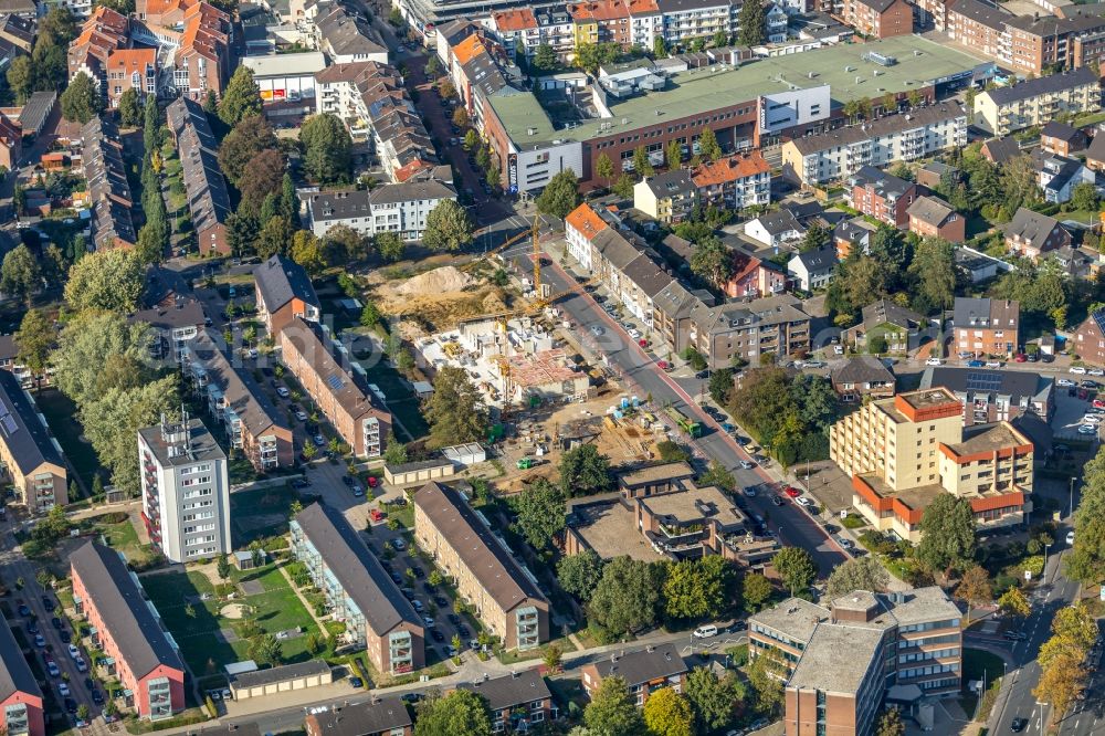 Wesel from the bird's eye view: Construction site to build a new multi-family residential complex of Wohnungsbaugenossenschaft Wesel eG on Kreuzstrasse in Wesel in the state North Rhine-Westphalia, Germany