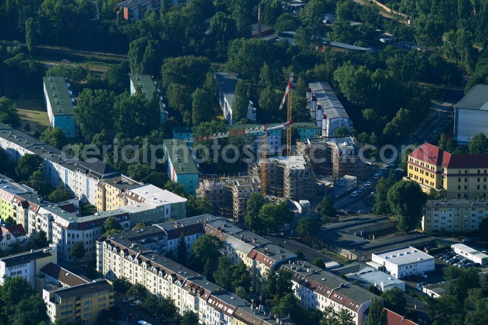 Aerial photograph Berlin - Construction site to build a new multi-family residential complex of Wohnungsgenossenschaft a??Treptow Sueda?? eG on Rudower Strasse in the district Treptow-Koepenick in Berlin, Germany