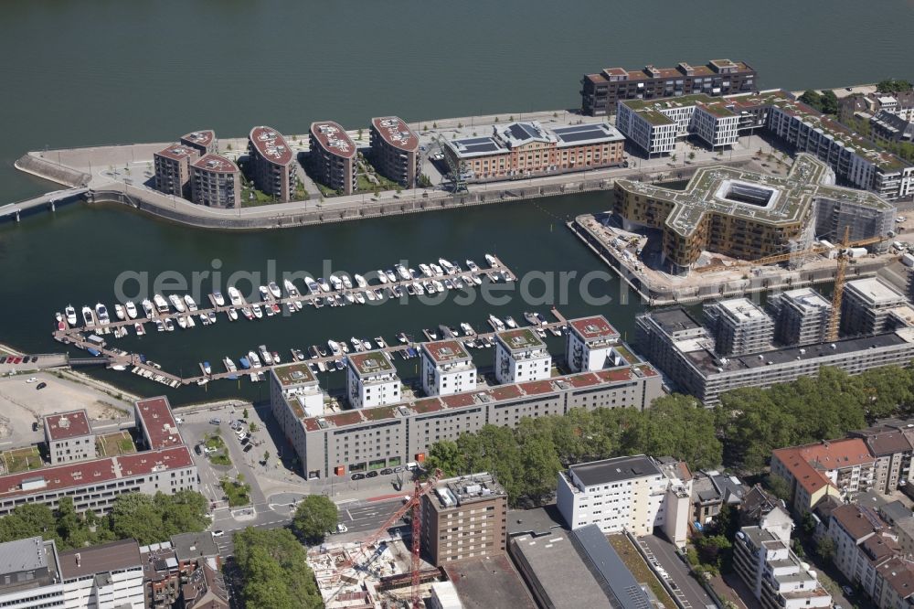 Mainz from the bird's eye view: Construction site to build a new multi-family residential complex on Zollhafen in Mainz in the state Rhineland-Palatinate, Germany