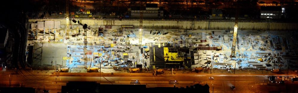 München from the bird's eye view: Night view of construction site to build a new multi-family residential complex on Schwabinger Tor along Leopoldstrasse in Munich in the state Bavaria