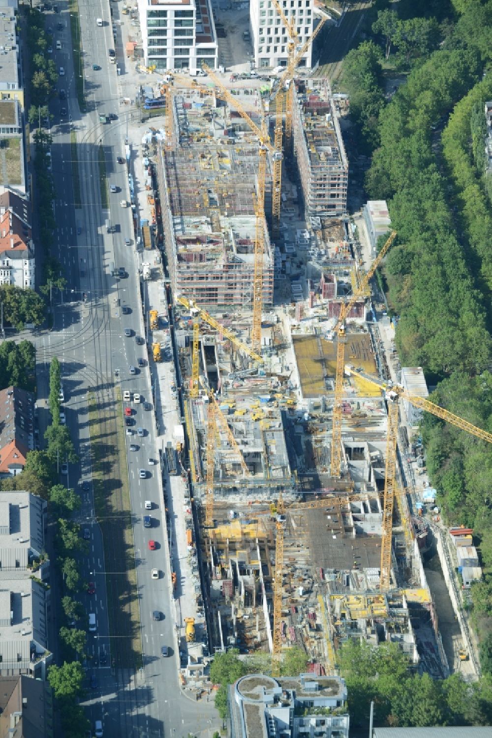 München from the bird's eye view: Construction site to build a new multi-family residential complex on Schwabinger Tor along Leopoldstrasse in Munich in the state Bavaria