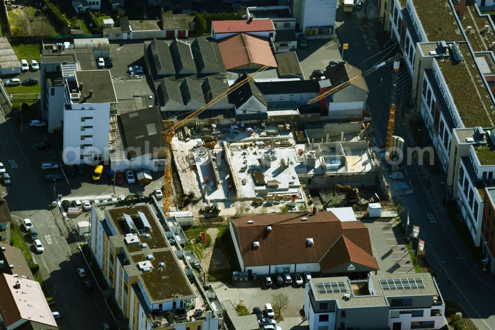 Aschaffenburg from the bird's eye view: Construction site to build a new multi-family residential complex Lange Strasse in Aschaffenburg in the state Bavaria, Germany