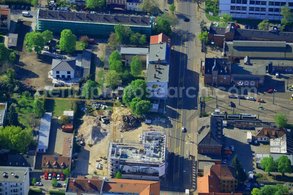 Berlin from the bird's eye view: Construction site to build a new multi-family residential complex on Wendeschlossstrasse in the Koepenick part of Berlin in Germany. The building will include 19 appartements and is located on the corner of Dorotheenstrasse