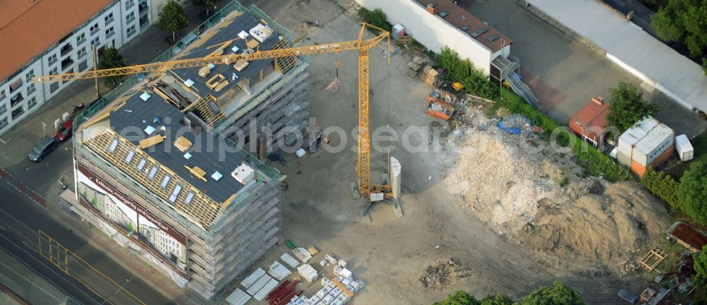 Berlin from above - Construction site to build a new multi-family residential complex on Wendeschlossstrasse in the Koepenick part of Berlin in Germany. The building will include 19 appartements and is located on the corner of Dorotheenstrasse