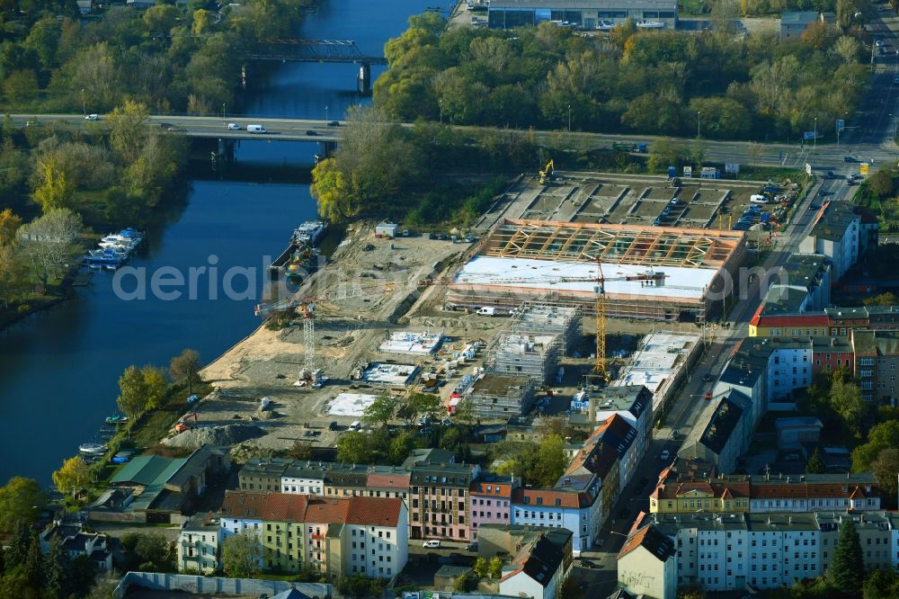 Aerial photograph Brandenburg an der Havel - Construction site for the new building of apartment houses and a REWE-Center supermarket on Neuendorfer Strasse in Brandenburg an der Havel in the state Brandenburg, Germany