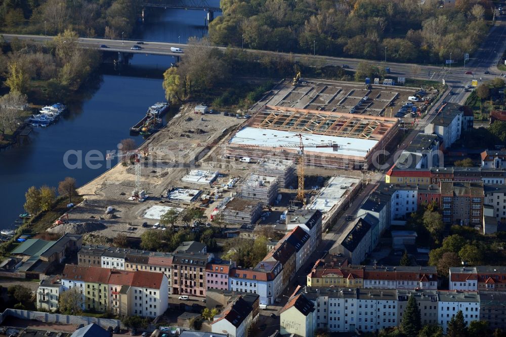 Brandenburg an der Havel from above - Construction site for the new building of apartment houses and a REWE-Center supermarket on Neuendorfer Strasse in Brandenburg an der Havel in the state Brandenburg, Germany