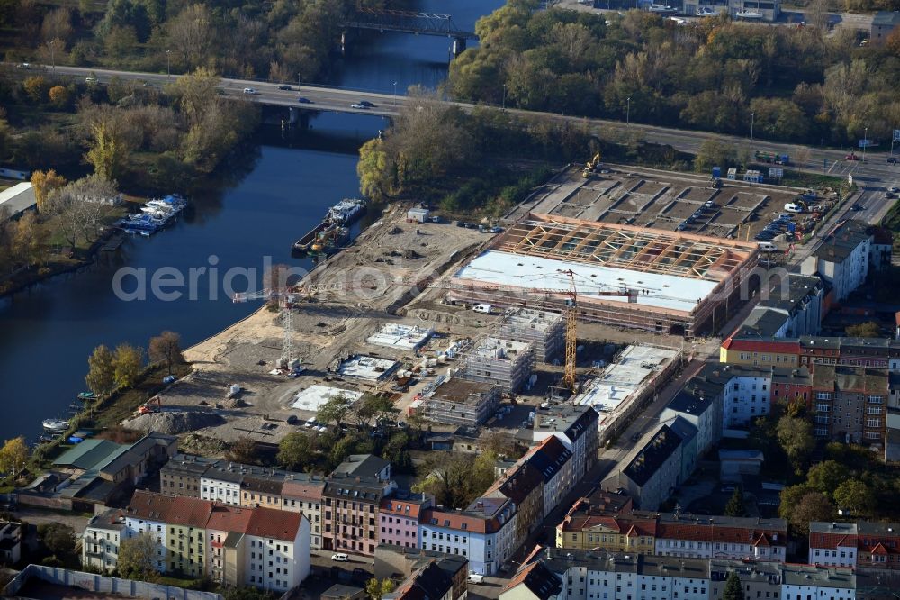 Brandenburg an der Havel from the bird's eye view: Construction site for the new building of apartment houses and a REWE-Center supermarket on Neuendorfer Strasse in Brandenburg an der Havel in the state Brandenburg, Germany