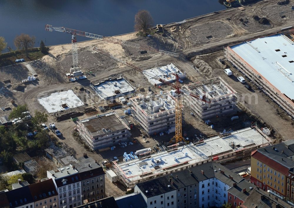 Aerial image Brandenburg an der Havel - Construction site for the new building of apartment houses and a REWE-Center supermarket on Neuendorfer Strasse in Brandenburg an der Havel in the state Brandenburg, Germany