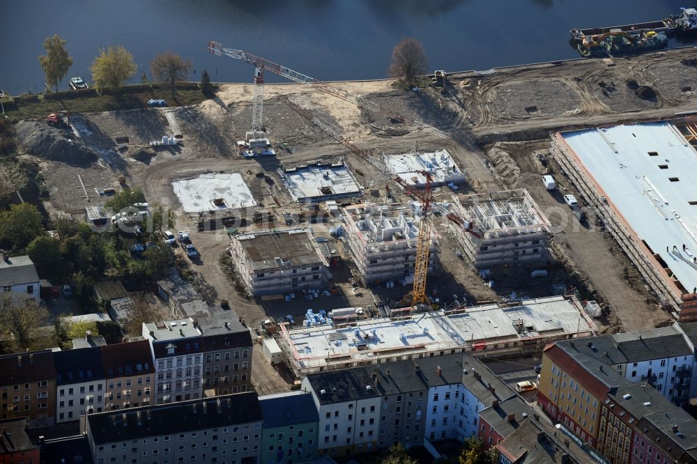 Aerial photograph Brandenburg an der Havel - Construction site for the new building of apartment houses and a REWE-Center supermarket on Neuendorfer Strasse in Brandenburg an der Havel in the state Brandenburg, Germany