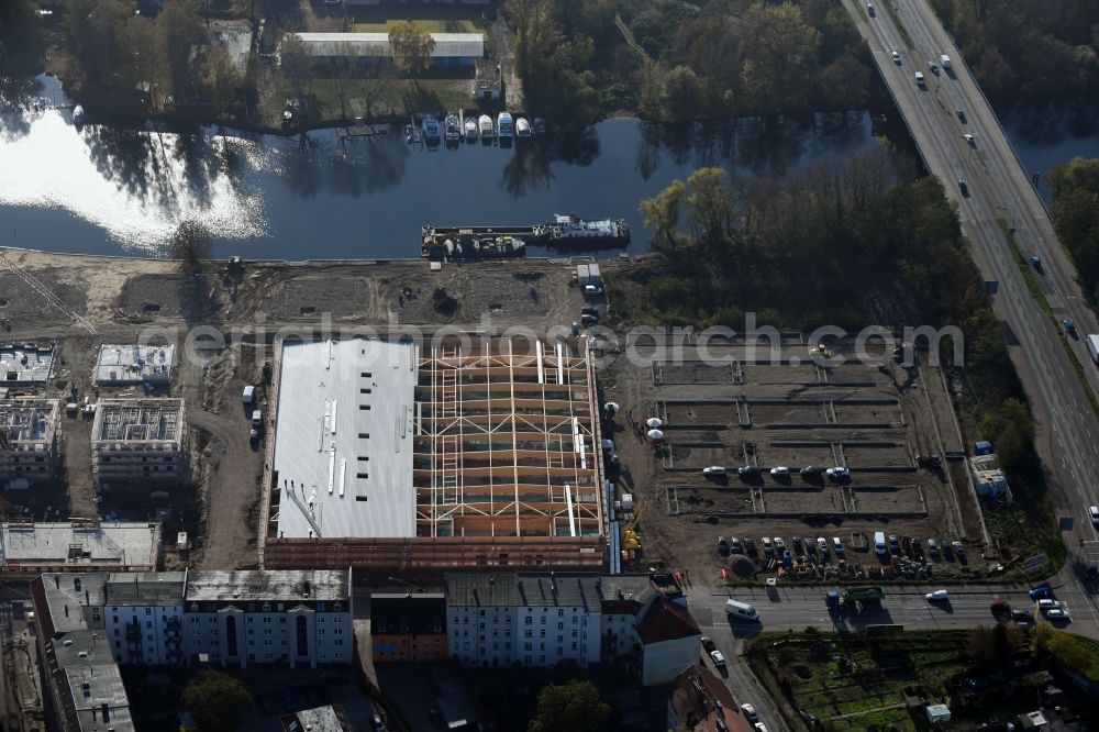 Brandenburg an der Havel from the bird's eye view: Construction site for the new building of apartment houses and a REWE-Center supermarket on Neuendorfer Strasse in Brandenburg an der Havel in the state Brandenburg, Germany