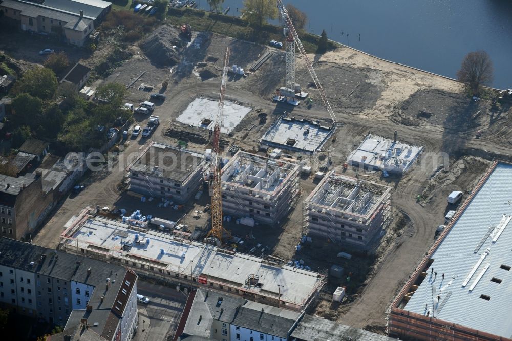 Aerial image Brandenburg an der Havel - Construction site for the new building of apartment houses and a REWE-Center supermarket on Neuendorfer Strasse in Brandenburg an der Havel in the state Brandenburg, Germany