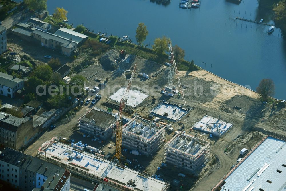 Aerial photograph Brandenburg an der Havel - Construction site for the new building of apartment houses and a REWE-Center supermarket on Neuendorfer Strasse in Brandenburg an der Havel in the state Brandenburg, Germany