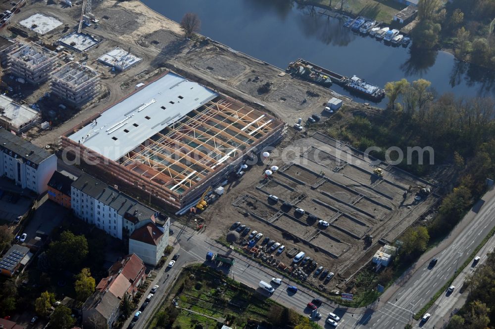 Brandenburg an der Havel from the bird's eye view: Construction site for the new building of apartment houses and a REWE-Center supermarket on Neuendorfer Strasse in Brandenburg an der Havel in the state Brandenburg, Germany