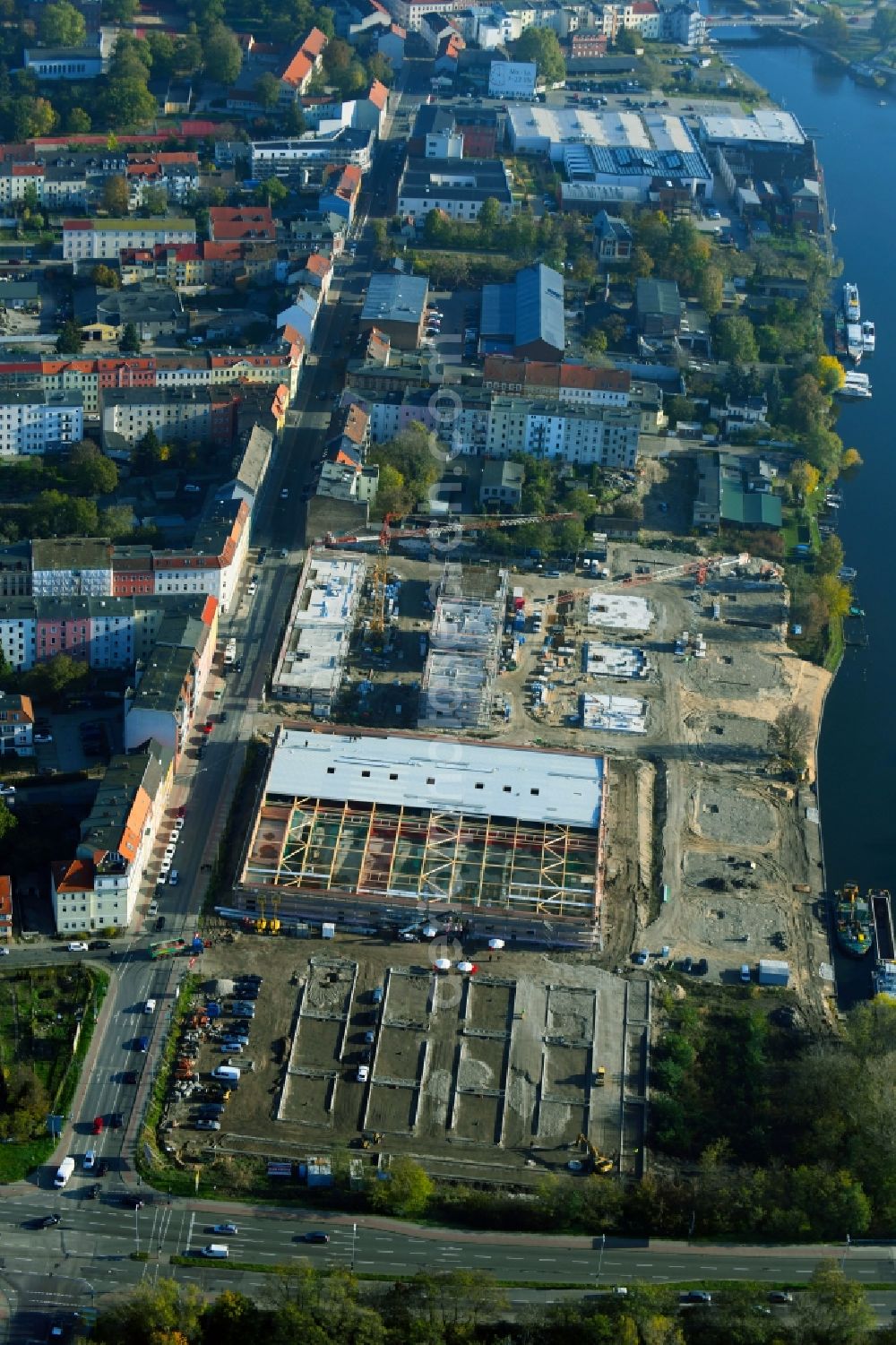 Aerial photograph Brandenburg an der Havel - Construction site for the new building of apartment houses and a REWE-Center supermarket on Neuendorfer Strasse in Brandenburg an der Havel in the state Brandenburg, Germany