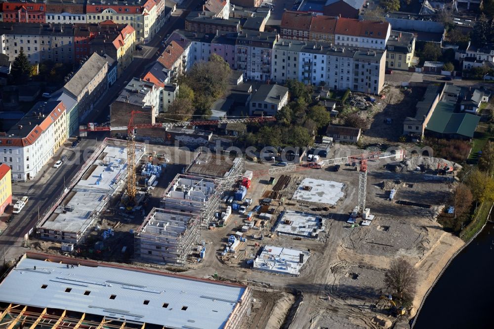 Brandenburg an der Havel from above - Construction site for the new building of apartment houses and a REWE-Center supermarket on Neuendorfer Strasse in Brandenburg an der Havel in the state Brandenburg, Germany