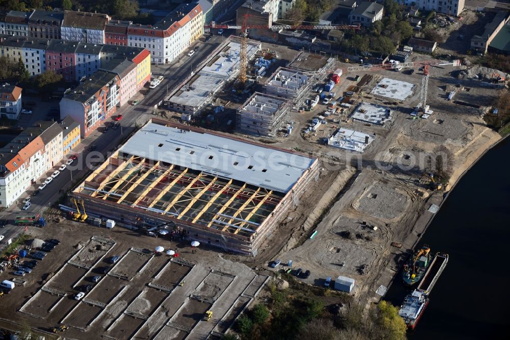 Brandenburg an der Havel from the bird's eye view: Construction site for the new building of apartment houses and a REWE-Center supermarket on Neuendorfer Strasse in Brandenburg an der Havel in the state Brandenburg, Germany