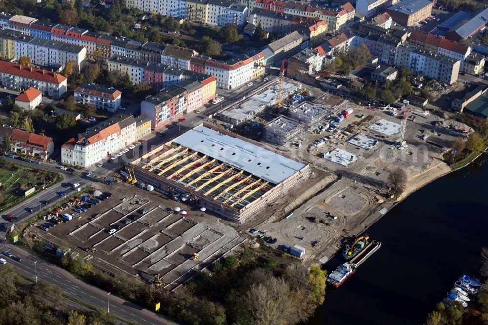 Aerial image Brandenburg an der Havel - Construction site for the new building of apartment houses and a REWE-Center supermarket on Neuendorfer Strasse in Brandenburg an der Havel in the state Brandenburg, Germany