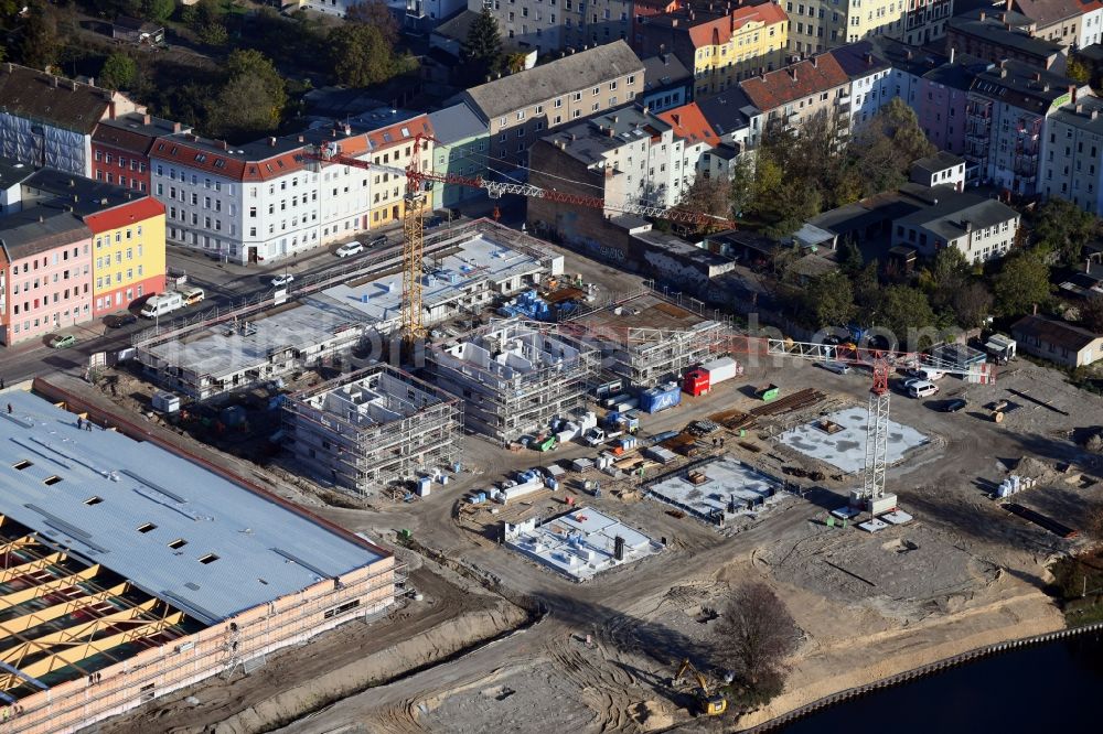 Brandenburg an der Havel from above - Construction site for the new building of apartment houses and a REWE-Center supermarket on Neuendorfer Strasse in Brandenburg an der Havel in the state Brandenburg, Germany