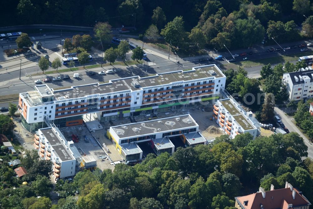 München from the bird's eye view: Construction site for the new building of an inter-generational residential estate on Scheidplatz in Munich in the state of Bavaria. The Forum am Luitpold is a project run by Stiftung Pfennigparade