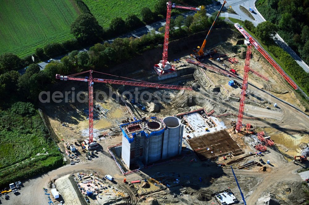 Stapelfeld from above - Construction site for the new construction of the waste incineration plant for waste treatment MVA residual waste combined heat and power plant and a mono sewage sludge incineration on the street Ahrensburger Weg in Stapelfeld in the state Schleswig-Holstein, Germany