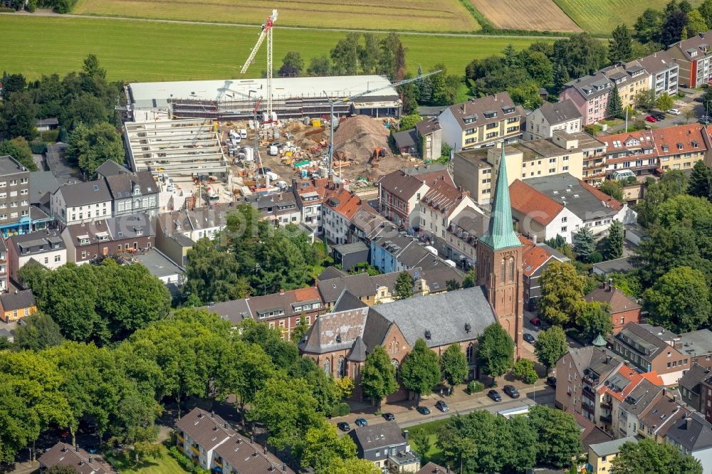 Essen from the bird's eye view: Construction site for the new building eines Nahversorgungszentrums along the Frintroper Strasse in Essen in the state North Rhine-Westphalia, Germany