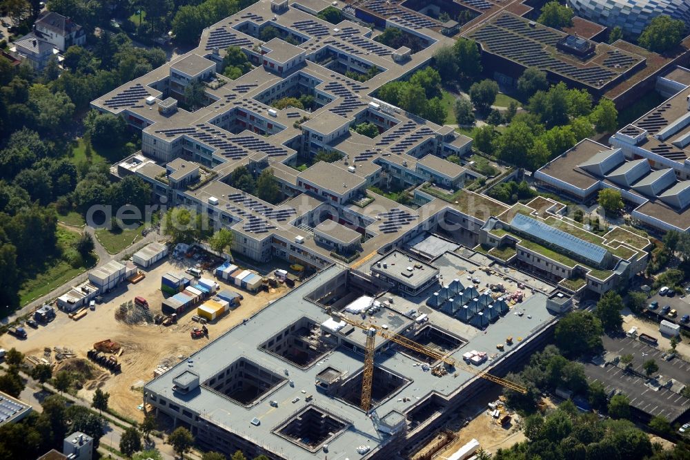 Aerial photograph Berlin - Construction site for the construction of a new library of small compartments and a scientific library of the Free University at the FU Berlin Dahlem Fabeckstrasse