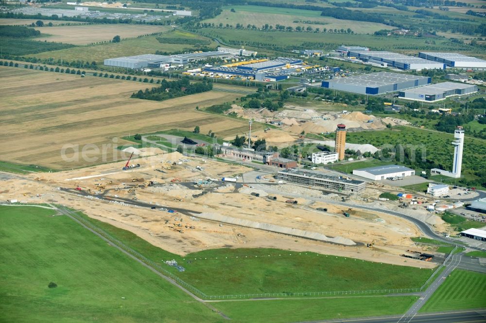 Aerial image Schönefeld - Building site to the new building for the new, passing government terminal on the airport area in the district beauty's field in beauty's field in the federal state Brandenburg, Germany. Building contractor is the Zueblin AG