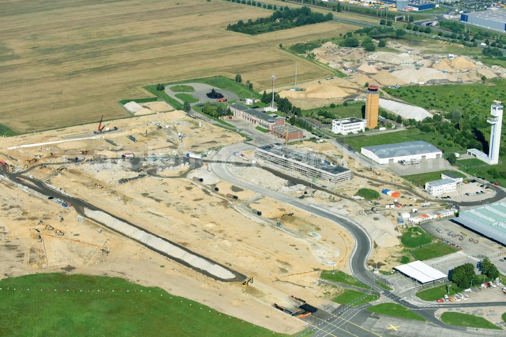 Aerial photograph Schönefeld - Building site to the new building for the new, passing government terminal on the airport area in the district beauty's field in beauty's field in the federal state Brandenburg, Germany. Building contractor is the Zueblin AG