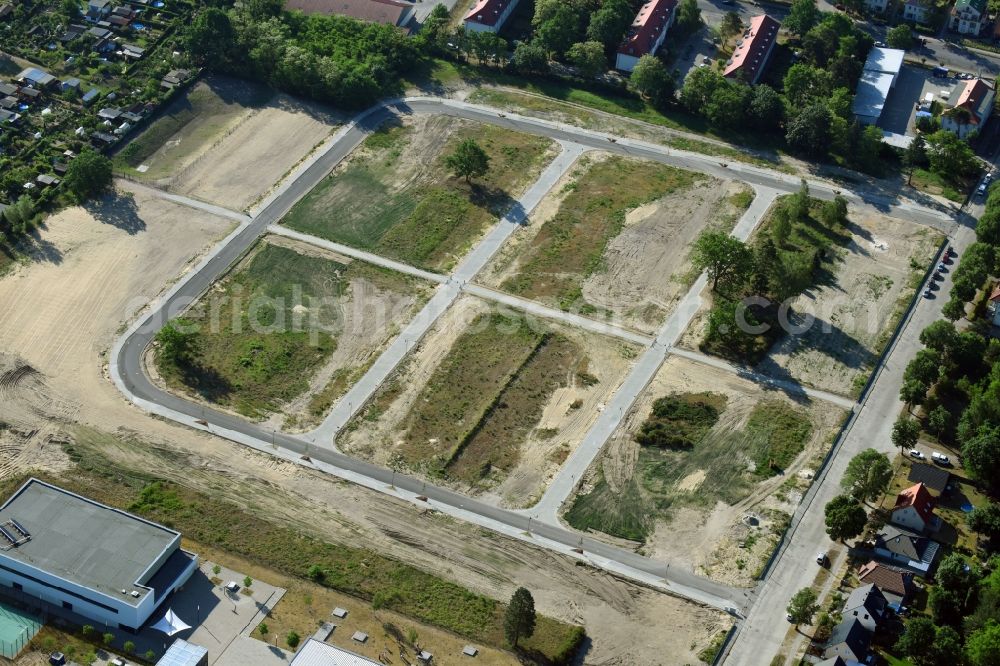 Stahnsdorf from the bird's eye view: Construction site of a new residential area on Heinrich-Zille-Strasse in Stahnsdorf in the state of Brandenburg