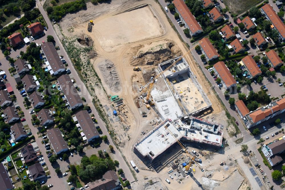 Aerial photograph Hönow - Construction site for the new building city destrict center between of Schulstrasse and of Marderstrasse in Hoenow in the state Brandenburg, Germany